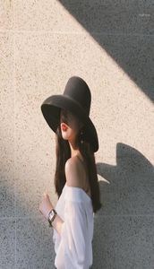 Audrey Hepburn strohoed verzonken modelleringstool klokvormige hoed met grote rand vintage hoge fantasie toeristische strandsfeer11729242