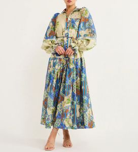 Australische designerjurk van zijde-katoenen lange jurk met bloemenprint en revershals met klokmouwen