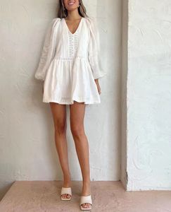 Australische designer jurk met lantaarnmouwen, witte geborduurde linnen mini-jurk