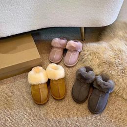 Zapatillas de moda australianas Sandalias superiores de diseñador Zapatos de nieve de gamuza de cuero de vaca Clásico Al aire libre Antideslizante Baotou cálido para mujer Una vuelta sobre el cabello 36-40