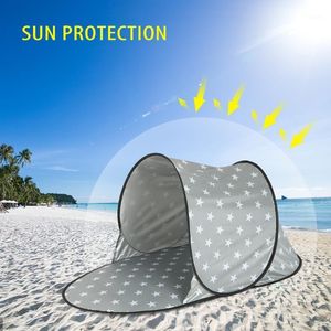 Tienda de campaña automática para exteriores, resistente al agua, tienda de playa Anti UV, ultraligera, refugios para el sol en el mar, toldo parasol1