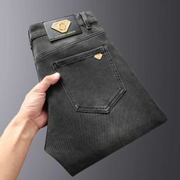 Herfst 2023 Jeans voor herenbusin high -end eenvoudige luxe veelzijdige slanke slanke rechte elastische broek