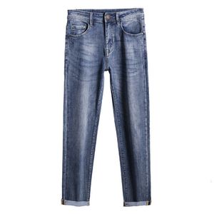 Automne et créateur hiver nouveau jeans de qualité masculine slim slim small small pieds pantalons longs v5EZ