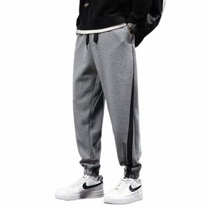 Herfst en winter herenbroek nieuwe collectie casual losse volledige lengte zijstreep trekkoord Koreaanse stijl joggingbroek mannelijke streetwear D2da #