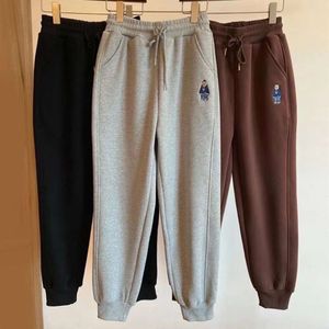 Otoño e invierno Nuevos pantalones de guardia bordado coreano Pantalones de la cintura elástica con peluche y gris negro engrosado en espesas