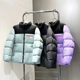 Chaqueta de cuello suelto de cuatro colores con empalme de otoño e invierno, el proceso de acolchado no funciona con cachemira, hombres y mujeres del mismo estilo, versión simple y de moda.