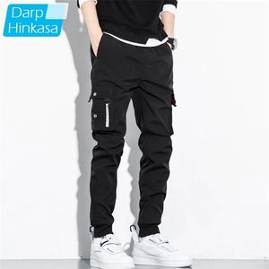 Otoño negro jogger hombres pantalones de carga al aire libre táctico militar casual suelto sudor pantalones de algodón tamaño grande 8xl 220330