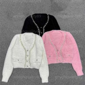 Herfstontwerper Women Sweater Fashion Cardigan jas lange mouwen korte lagen slanke elegante top gebreide truien damesjas