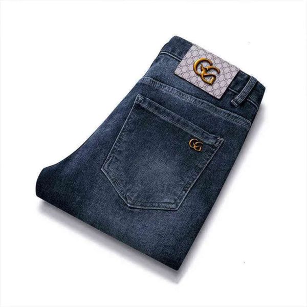 Autumn Gouoi Jeans Moda e invierno Moda coreana Jóvenes elásticos Fit Pequeños Pantalones de marca de alta gama Pantalones bordados Men Mujeres Casuales sueltas 433