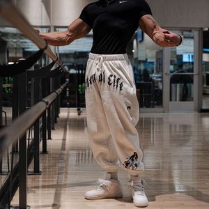 Herfstheren joggers broek verdikte veelzijdige mode fitness sport sport heren elastische outdoor hardlopen basketbal oefening strap guard trekkoord slank