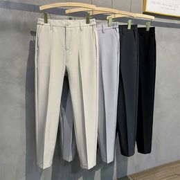 Pantalones de traje cónico para hombres otoñales Color delgado Color sólido No-hierro Oficina de negocios Casual Pants de gris negro Tamaño 38 40 42 240425