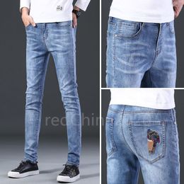 Autumn New Broidered Logo Head Mens Ripped Slip Fit Elasticity Jeans Men's Herming Business Famme Classic Casual Colters Coltom Coltwe