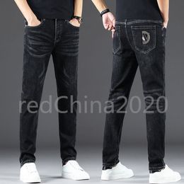Autumn Nieuwe geborduurde logo hoofdheren gescheurd slanke fit elasticiteit jeans rechte zakelijke beroemde klassieke casual broek casual broek groothandel v3890