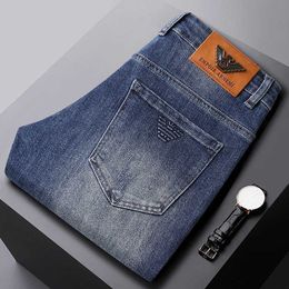 Automne / hiver 2022 Jeans bleu profond pour hommes Hong Kong Fashion Brand Slim Fit Elastic Feet Denim Pantalon