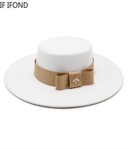Herfst winter Franse dames witte bownot platte top fedora hoed 10 cm rand banket elegante vilt hoed trouwjurk cap 2205245405183