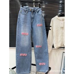 Automne / hiver Miu Home Pink Detking Brush Letter Broidered Jeans for Women