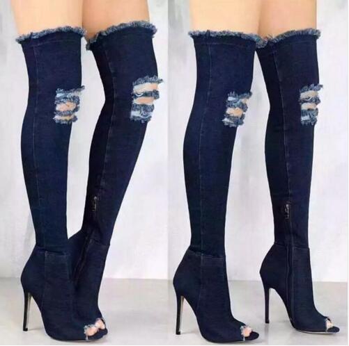 knee high boots with ripped jeans