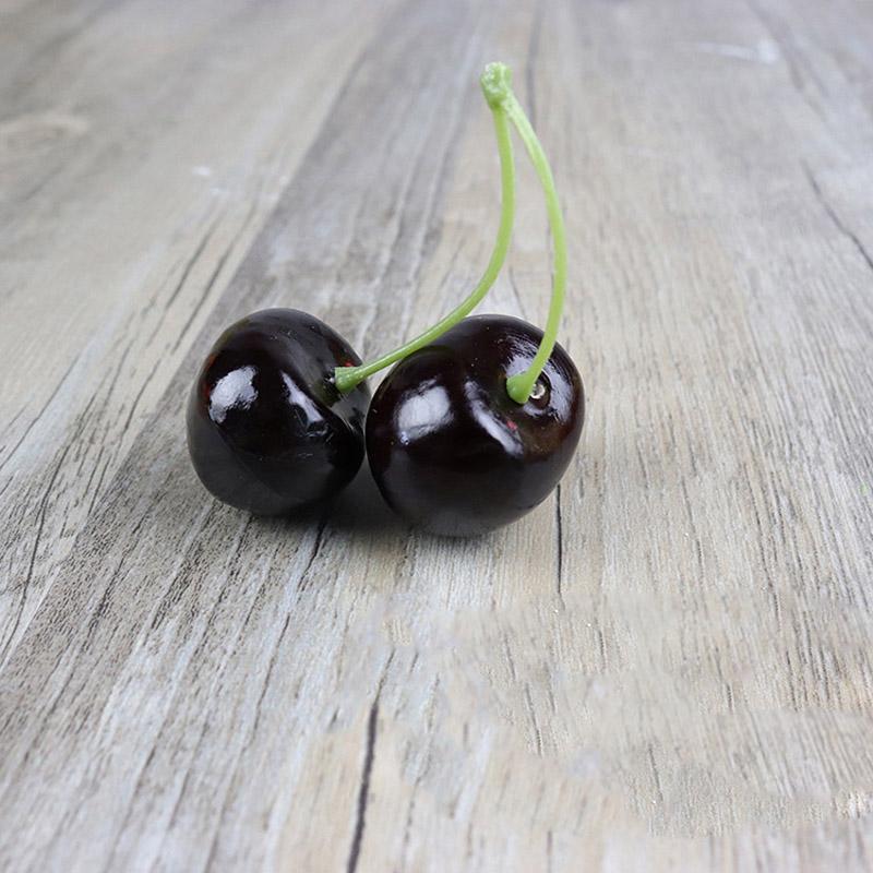 Pair of purple Cherries