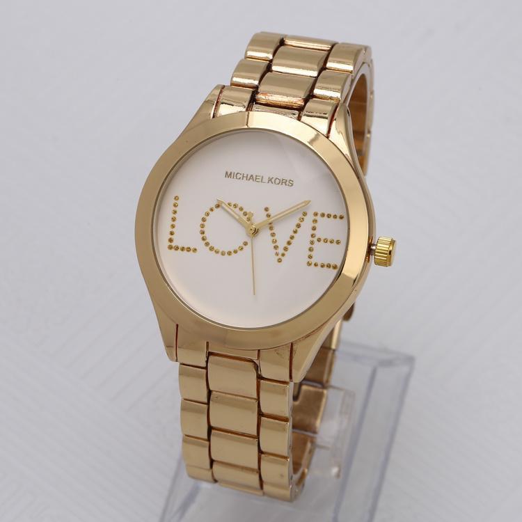 mk gold watch
