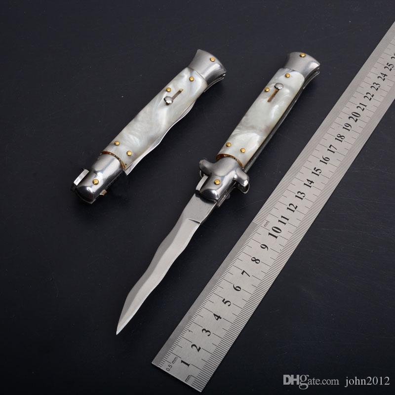 White mica handle serpentine blade