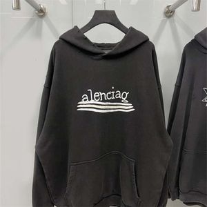 B Family Sudadera con capucha elegante con textura Versión alta Paris Authentics Cola Graffiti Sudadera con capucha de felpa BLCG Sudaderas con capucha negras Suéter Unisex