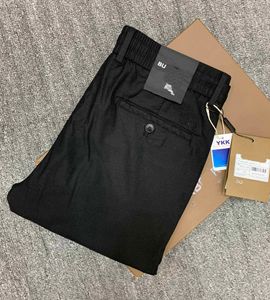 B Pantalones para hombre, pantalones informales de negocios de lujo de diseñador, tela de lino con Color sólido 1:1, tela personalizada, ropa negra y azul al por mayor
