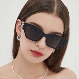 Gafas de sol estilo B estilo ojo de gato triangular 23 nueva moda estilo cóncavo gafas de sol de foto de calle gafas de sol de Instagram para mujer