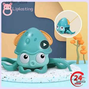 Jouets de bain pour bébé rotation de pieuvre en volite jouet rampe de pieuvre jouet de jeu de bain avec une musique induction enfants