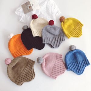 Gorros de bebé Gorros de lana para niños Sombrero de hilo de punto de ganchillo Protectores de oídos de moda Orejeras Bola Decoración superior Gorro de calavera Sombreros cálidos de invierno para recién nacidos BC91