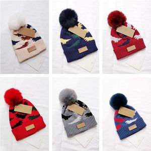 Bébé garçon chapeau mignon pompon dinosaure casquette Beanie hiver chaud tricoté enfants filles chapeau solide boule de fourrure élastique enfants casquettes Bonnet