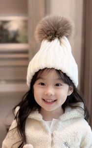 Bébé garçon chapeau mignon pompon hiver chaud tricoté Bonnet enfants filles chapeaux solide boule de cheveux élastique enfants casquettes Bonnet de noël 2-10Y