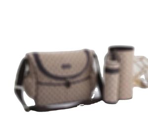 Sacs à couches pour bébé avec interface USB Kits de sacs à couches imperméables de grande capacité Sac de maternité pour maman + tapis à langer + support de bouteille A1