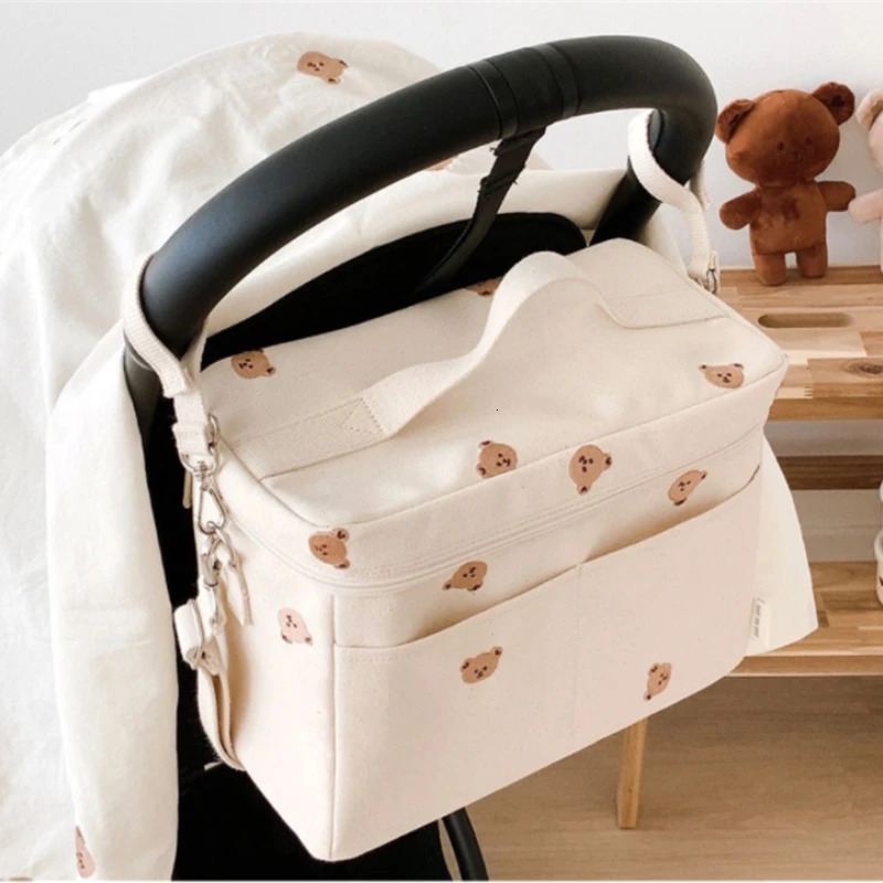 Baby Wickelbeutel Outdoor Mommy Umhängetasche wasserdichte Babyflaschen Isolierung Mama -Bag Baby Cart Hanging Bag Trolley Accessoires 240512