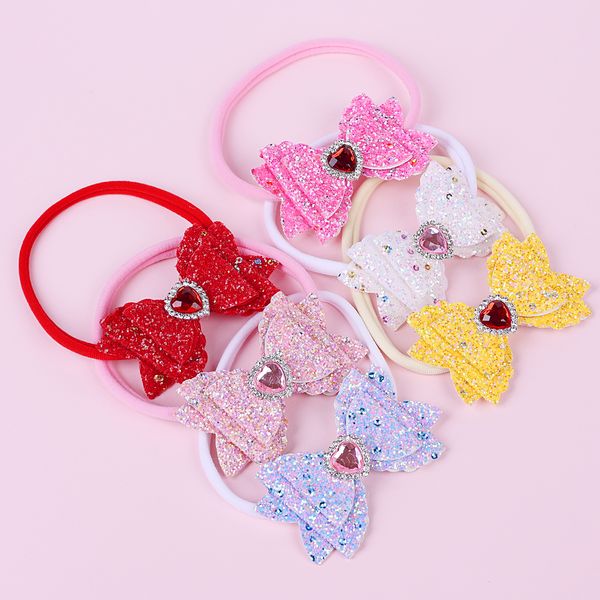 Bandes de nylon bébé Bandeau de nylon brillant paillettes arc solide couleur enfants Valentine Jour élastique Bowknot Hairband Heart Bande Strass Strass WKHA25