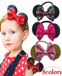 Baby Gold Sequin Bow Bandbandage en bas âge en basc