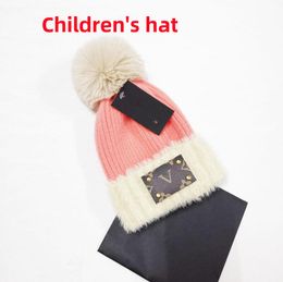 Babyhoeden kinderen jongens haken hoeden Europese kinderen meisjes hoeden schattig herfst/winter warme gebreide pompoms babyhoeden beanie hoeden solide Noord-Amerikaanse haarballen 2-12 jaar oud