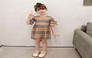 Baby kindermeisjeskleding Mini-jurken met lange mouwen Leuk casual feestoverhemdjurk Meisjeskleding236a6625719