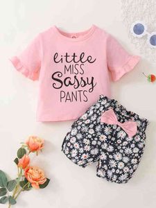 Camiseta con estampado de letras y manga con volantes para bebé Pantalones cortos con lazo y estampado de margaritas SHE