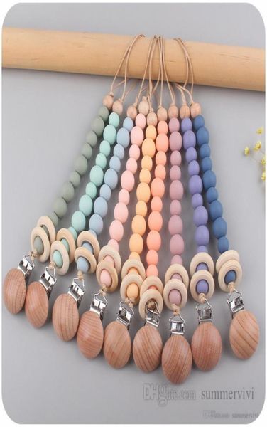 Clips para chupete de bebé cuentas de silicona para bebés soportes para anillos de dientes cadena para niños pezón de madera apaciguar chupete se desliza clip para chupete 15 colores Q4752078488