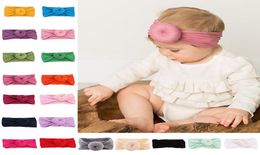 Baby Turban 22 Colores sólidos Donuts Nylon Headwraps Estilo bohemio Infant Baby Girls Round Nylon Soft Wide Hair Band Kids Headbands3990113