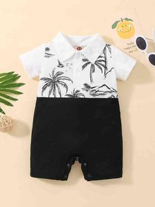 Baby twee toon boot palmboom print polo nek romper zij