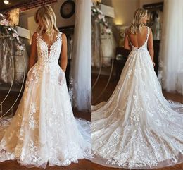 Robes de mariée en dentelle sexy sans dos avec poche A LINE V APLIQUES NOUT