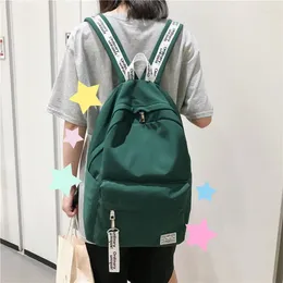 Sac à dos 2024 coréen de mode féminine en nylon junior lycéen schoolbag schol man mande backpacks bands sacs