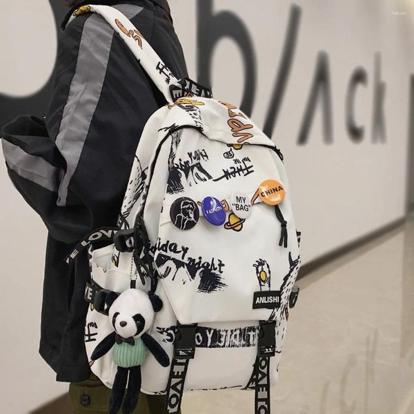 Mochila Cool Mujeres Hombres Patrón de graffiti Trendy Lady Travel Badge Harajuku Bolsa Mujer Hombre College Girl Boy Student