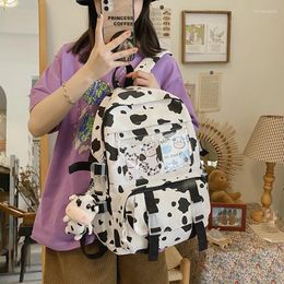 Sac à dos enopella fashion femmes toile livre de livre de livre de voyage mochila mignon vache imprimée sac à dos féminin pour collégiale sacol