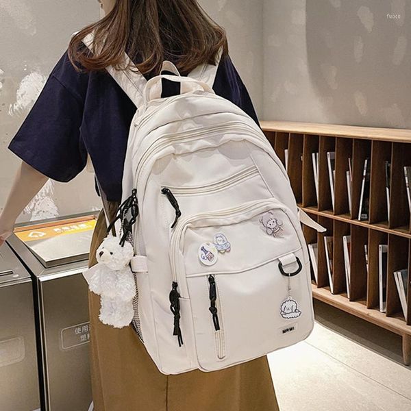 Mochila de moda para mujer, estudiante, resistente al agua, con insignia de oso, de nailon, para ordenador portátil, Mochila escolar, para viajes de ocio, bonita Mochila para mujer