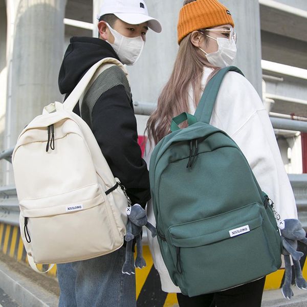 Sac à dos de mode coréen sac à dos pour femmes sacs d'école en nylon simples hommes voyagent couple d'ordinateur portable décontracté