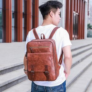 Sac à dos coréen masculin de mode masculine sac écoliers pour hommes pour adolescent noir pu en cuir pun bagpack grande capacité de voyage de voyage