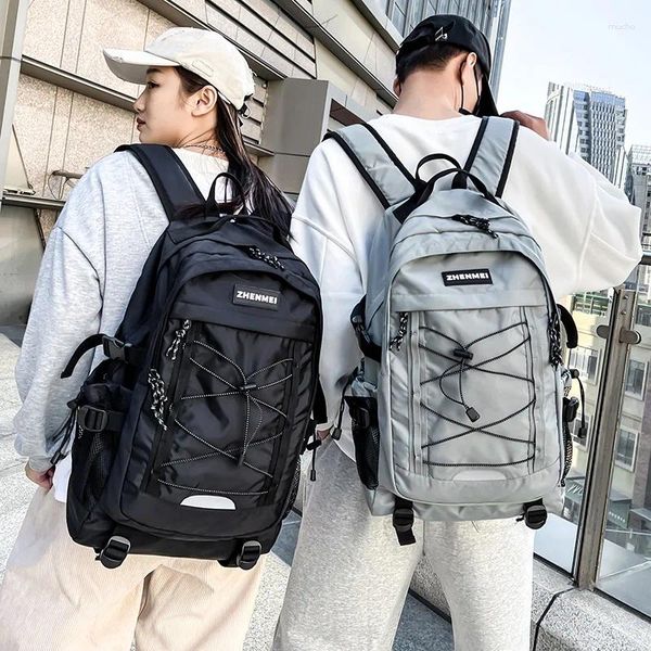 Mochila al aire libre para hombres y mujeres a gran capacidad universitaria de la universidad de viento secundaria