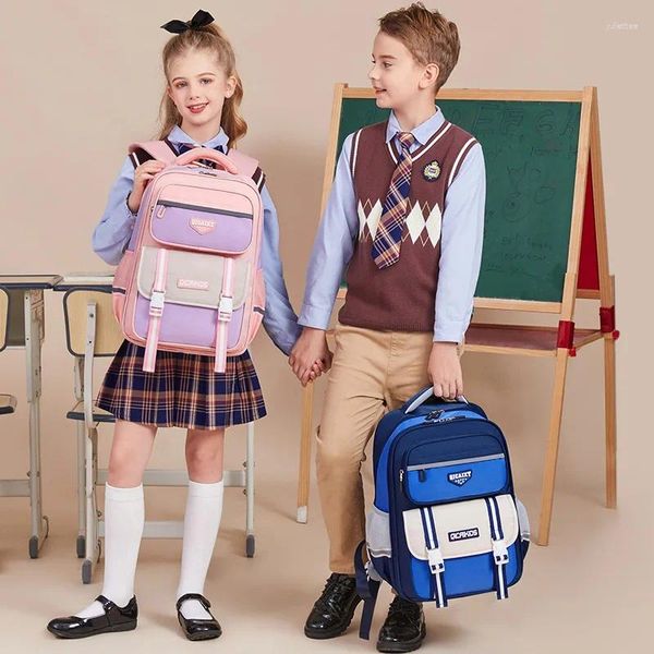 Bolsas de la escuela primaria de mochila Niños Lindos Moda Inglaterra Estudiante Escuela de alumnos Gran capacidad Protección de la columna